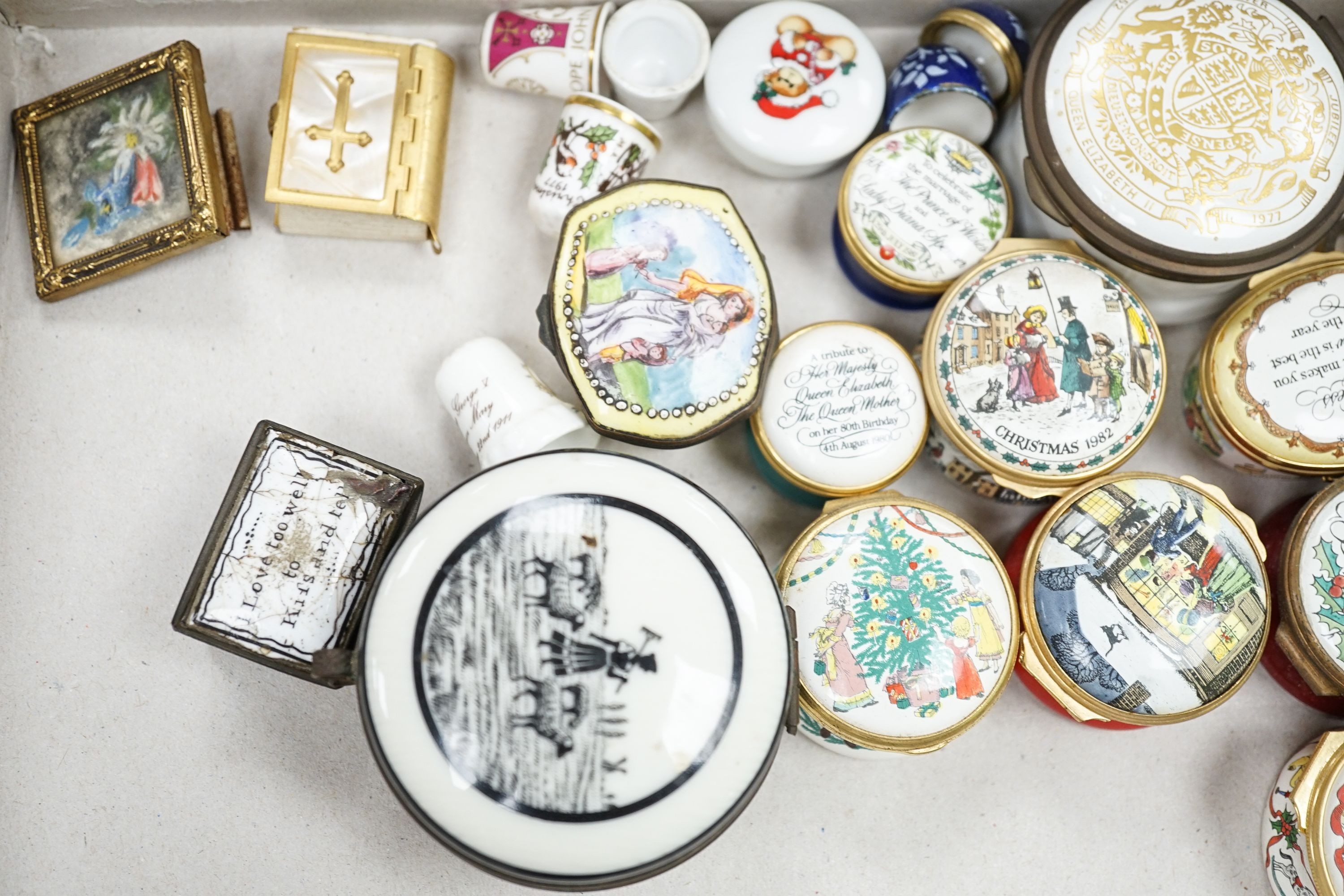 A collection of enamel patch boxes including Halcyon Days